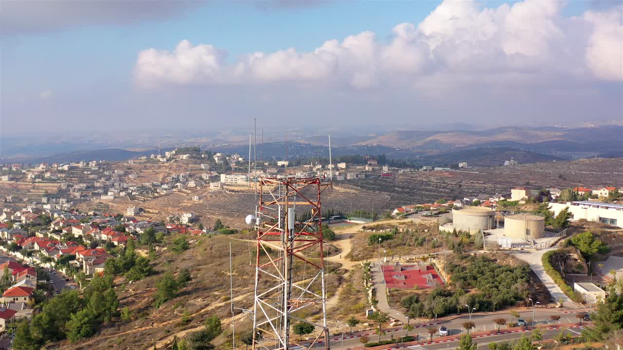 Aerial View of a Town with Communication Tower