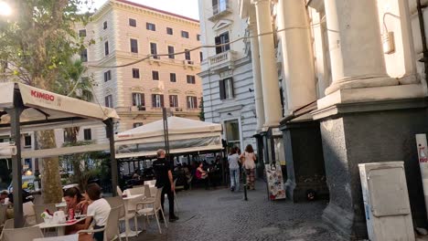 people dining and walking in naples, italy