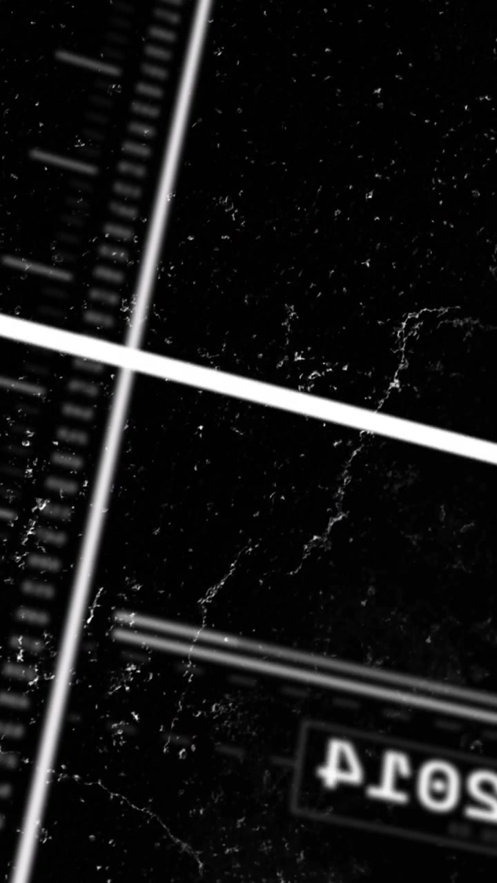 Video verticale: Inizio rotazione, righello e caselle numeriche che si inclinano, rivelando uno sfondo maculato.