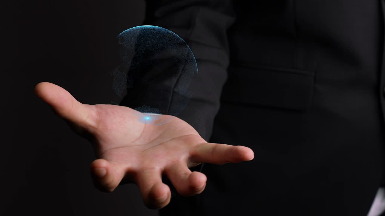 mano humana sosteniendo el globo terrestre tecnología holográfica