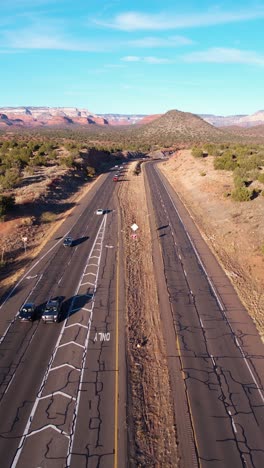 vertical drone shot of traffic on arizona 89a state route between sedona and cottonwood