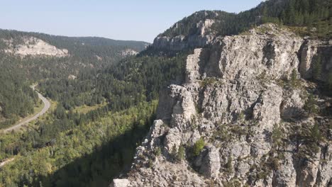 Drone-panning-right-through-Spearfish-Canyon-in-the-fall