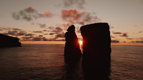 sunset over volcanic rock formations