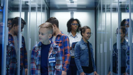 children on a tour of a server room
