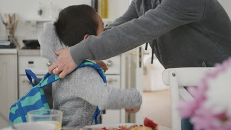 little asian boy getting ready for school happy father preparing son for first day waving goodbye 4k