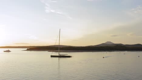 big sail boat in the coast of croatia during the sunset