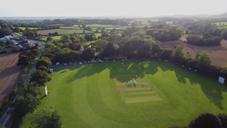 A-drone-shot-of-an-English-Cricket-game-in-late-evening