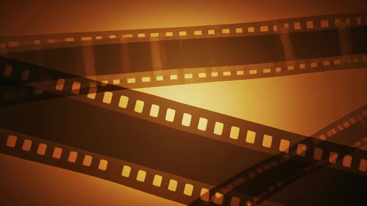 Strisce in Movimento di Pellicola Cinematografica Vintage su Sfondo Dorato