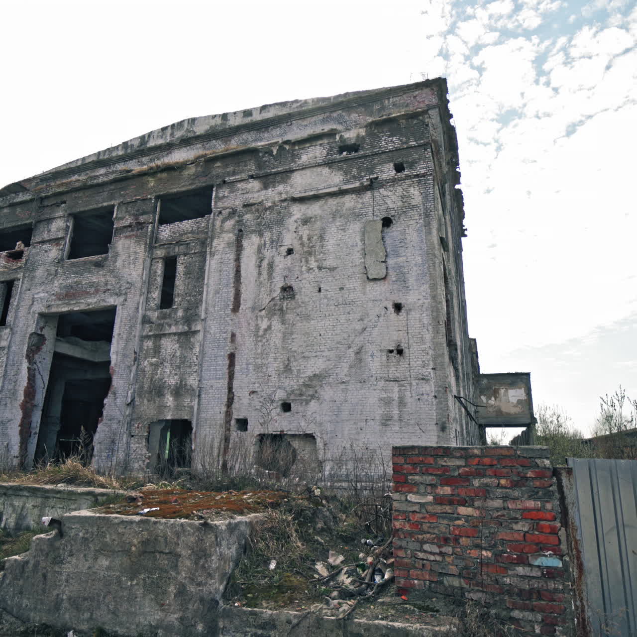 The ruins of the former factory. Ruined buildings in the city.