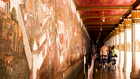 artists restoring temple murals in wat phra kaew