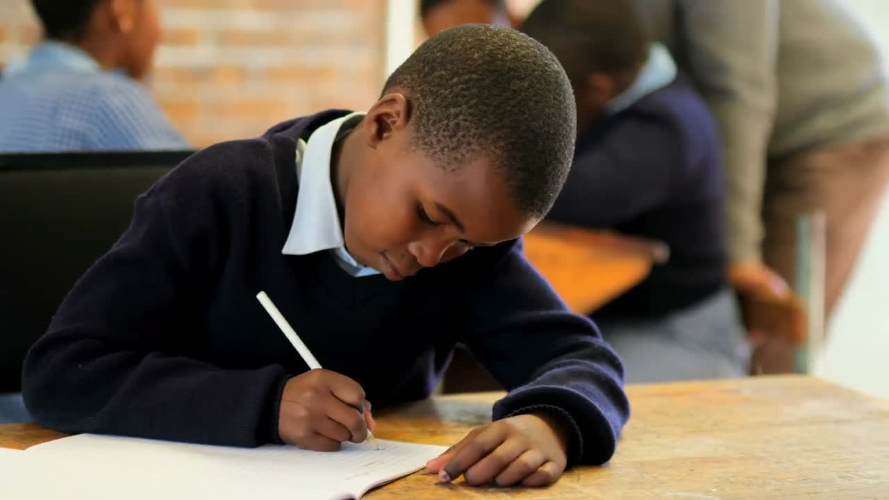Schoolkid studying in the classroom 4k