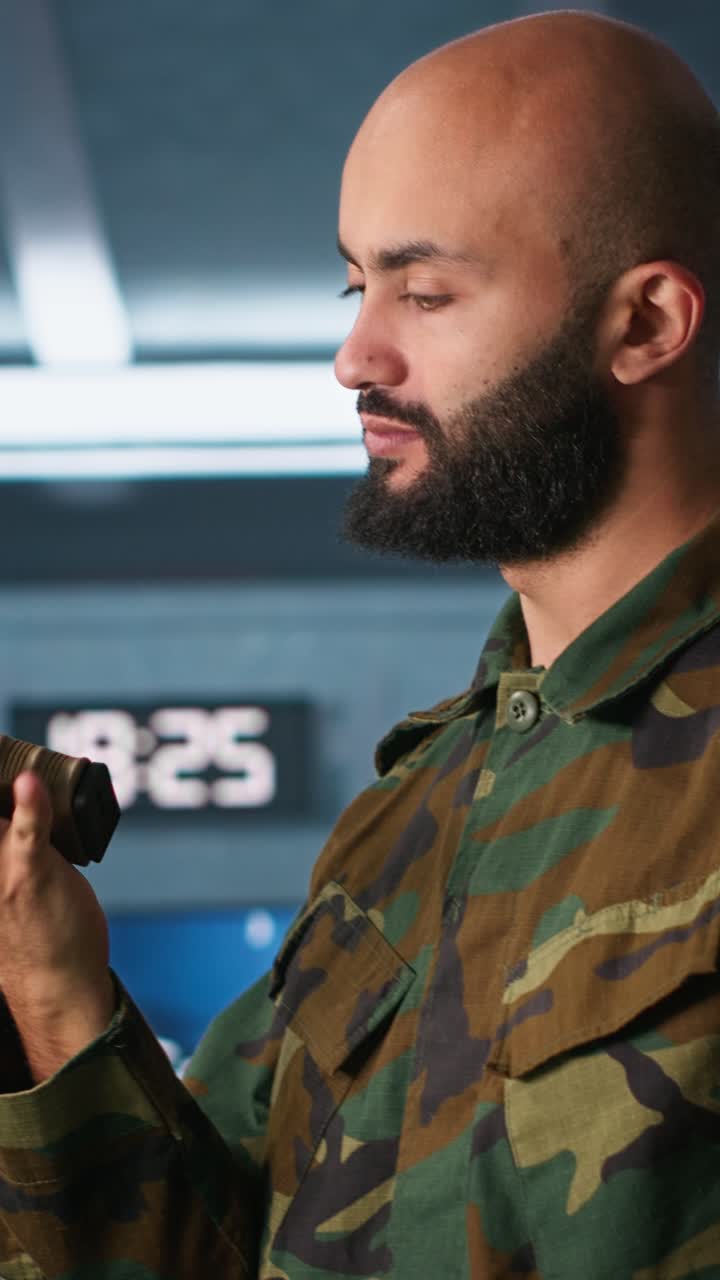 Vertical video Operatives conducing anti terrorism mission, loading weapons