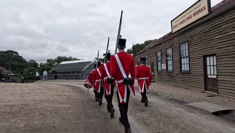 soldiers in red uniforms marching in sovereign hill