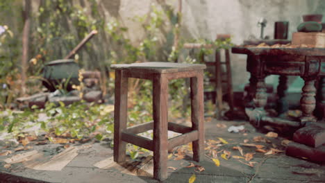 old wooden stool in an abandoned room