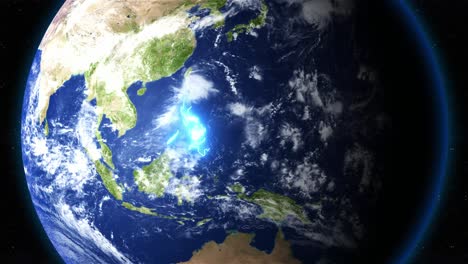 blue outline highlighting the geographical area of philippines on earth from space. - graphics
