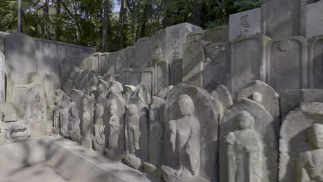 buddhist stone statues are very common in all temples in japan