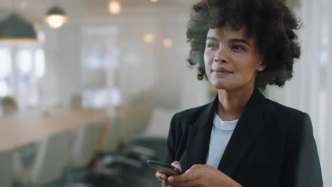 smart-black-business-woman-using-smartphone-in-office-texting-sending-emails-planning-meetings-networking-online-browsing-messages-on-mobile-phone-technology-4k