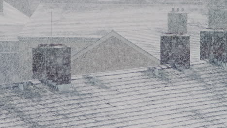 chimeneas de una zona residencial de londres durante una fuerte nevada