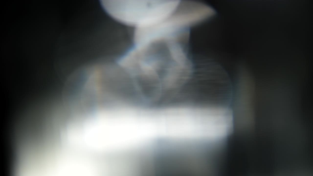 Abstract Light Leaks On Black Background.