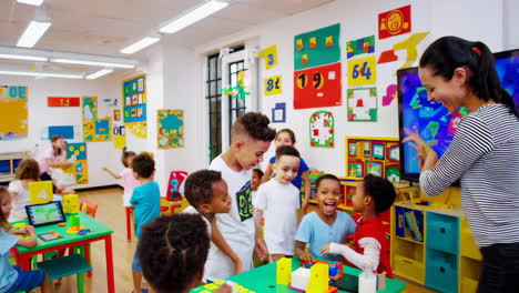 teacher and diverse students engaged in a hands-on science experiment in classroom