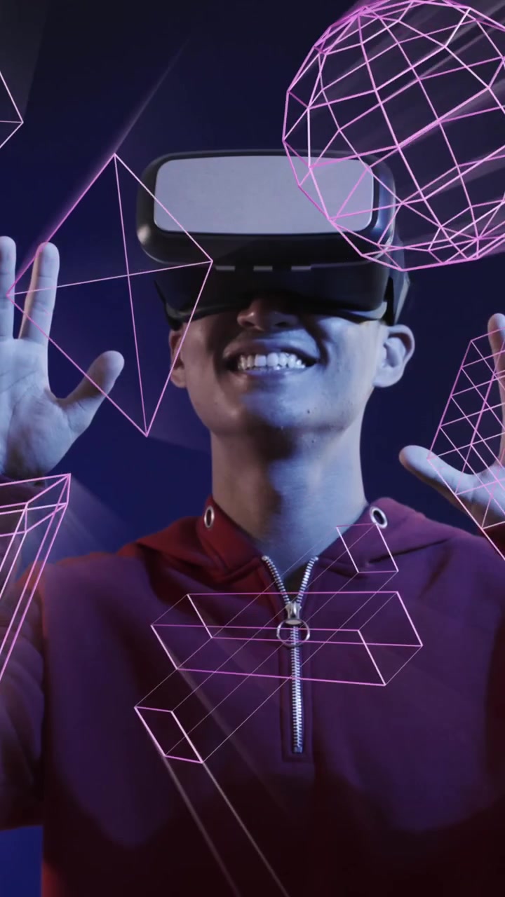 Animazione di forme 3D luminose su un uomo asiatico che usa un visore VR