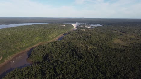 aerial panorama view of iguazu river in amazon rainforest and garganta del diablo waterfall at horizon