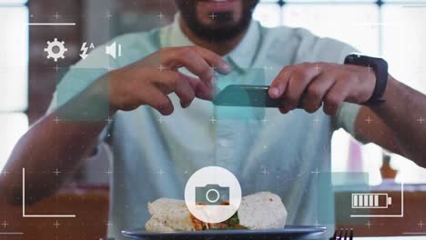 Animation-of-digital-interface-over-man-taking-photos-of-food-with-smartphone