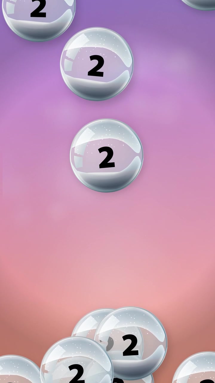 Transparent glass spheres containing the number two fall vertically against a soft pink gradient background.