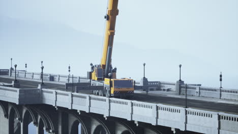 crane on a bridge during construction or maintenance