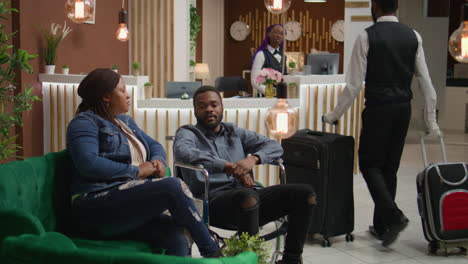 woman wheelchair user in lounge area