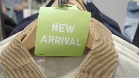new arrivals display in clothing store