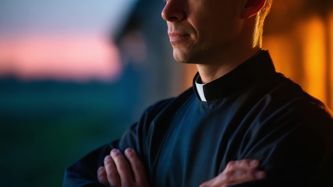 A contemplative figure dressed in a traditional garment stands quietly, reflecting on life moments as the sun sets, creating a serene and introspective atmosphere