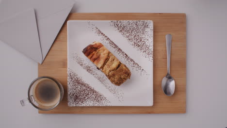 a slice of cheesecake with coffee