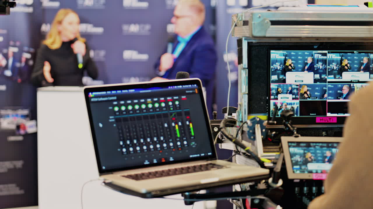 Cannes, France - February 15, 2025: Behind-the-scenes look of media production with professional equipment at a conference