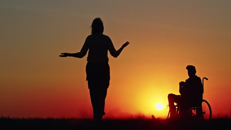 sunset walk with loved one in wheelchair