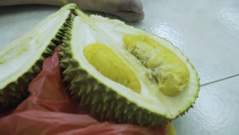 close up shot of the inside part of mao shan wang durian - handheld