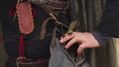 Medieval-knight-with-leather-bag-and-coin-purse-on-belt