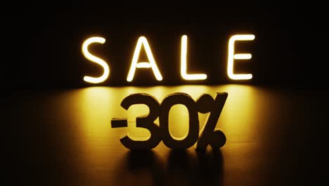 Composition-of-neon-sale-text-on-black-background