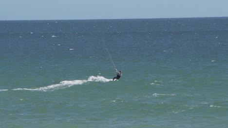 a man doing kit surf