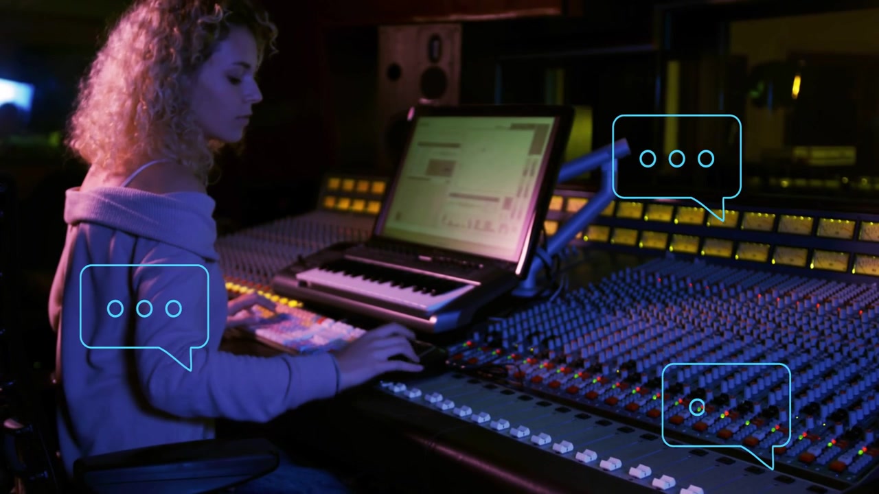 Tight closeup starting on right hand turning knobs, curly-haired operator moving faders mixing