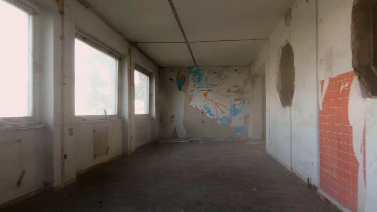 Tracking shot through an abandoned corridor