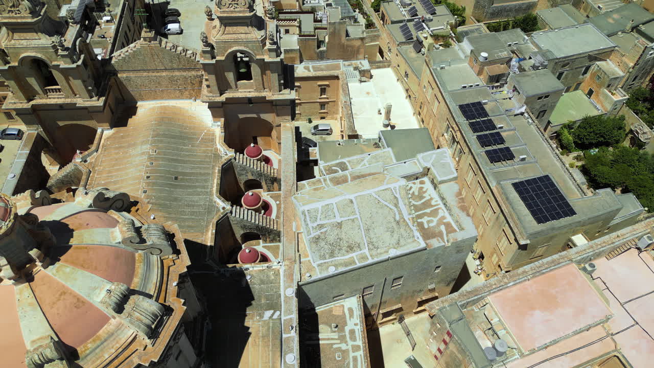 Aerial drone view of the walled city of Valletta, Malta, surrounded by the Mediterranean sea in daylight