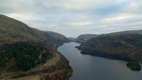 Cinematic-aerial-landscape-footage-of-Thirlmere-lake,-reservoir-in-the-Borough-of-Allerdale-in-Cumbria