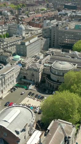 Advancing social ratio aerial video of the Irish Government's Seanad Éireann building in Dublin City Centre, Ireland on a bright and sunny day. Filmed in 1080x1920 and with Rec709 color