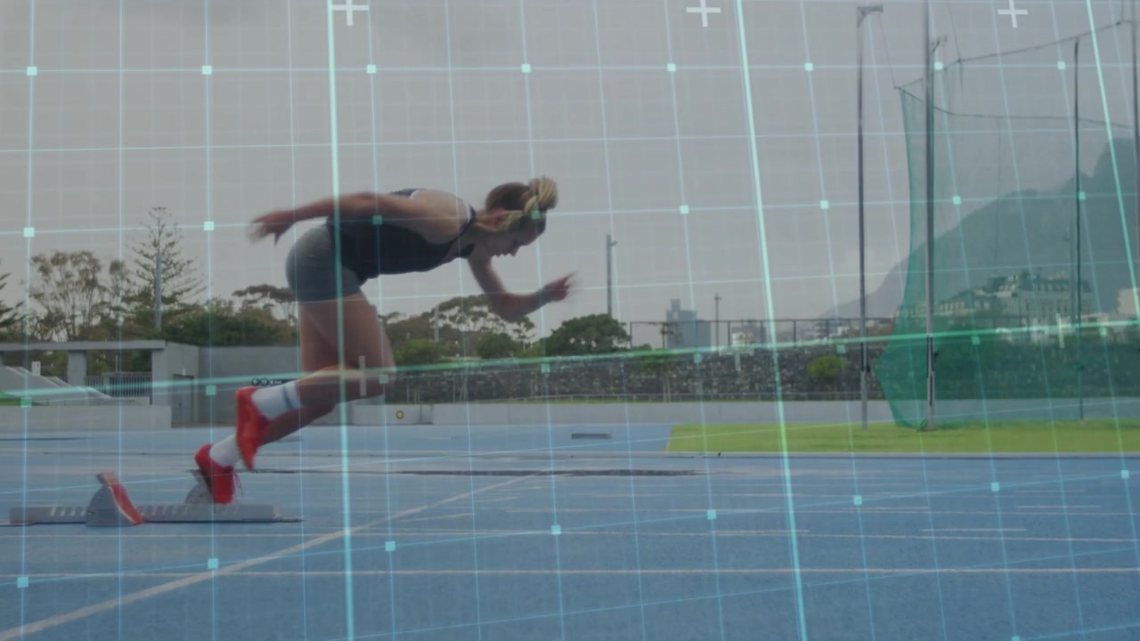 Sprinter shifting into blocks then pushing off on blue sports track, grid overlay analyzing start