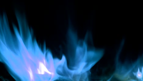 blue fire flames in super slow motion, shooted with high speed cinema camera