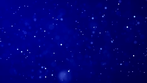 un bucle de partículas de 4k con un fondo azul sin costuras.