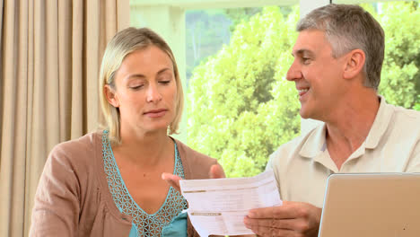 couple disagreeing about bills