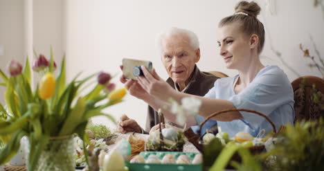 senior man and woman taking selfie photo at easter holidays