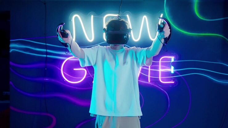 Young Man Playing Virtual Reality Game in Neon Lit Room